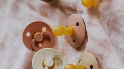 Bibs: Pacifier Nipple + Size Guide