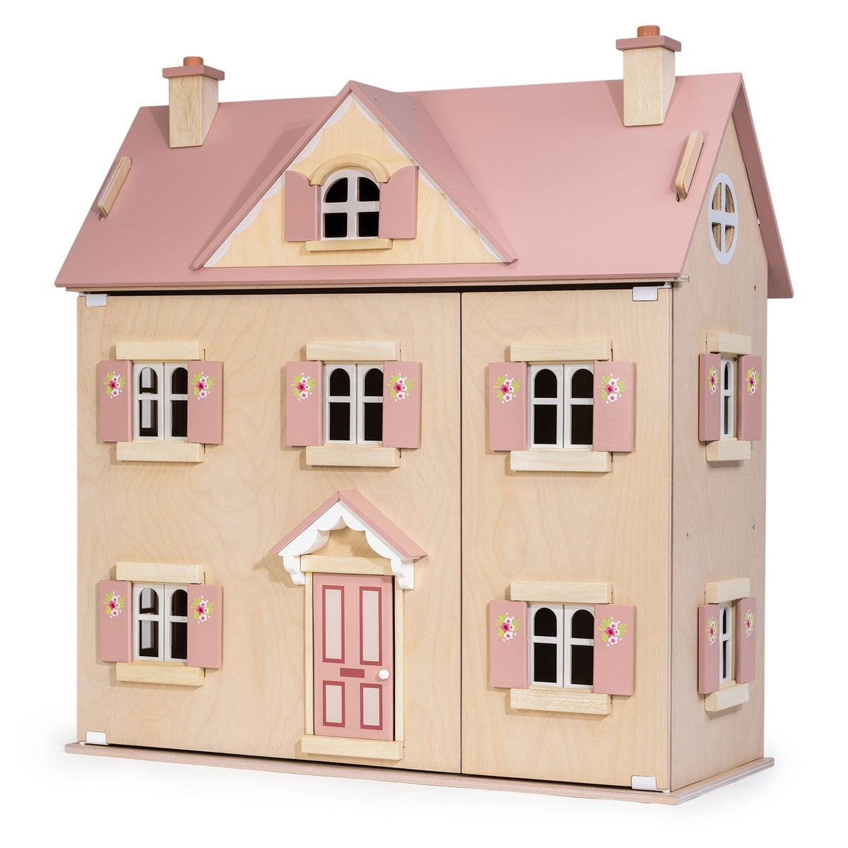 A wooden dollhouse styled like a two-story house, featuring a light natural wood body, a pink roof, pink shutters, and a pink front door with small floral details.