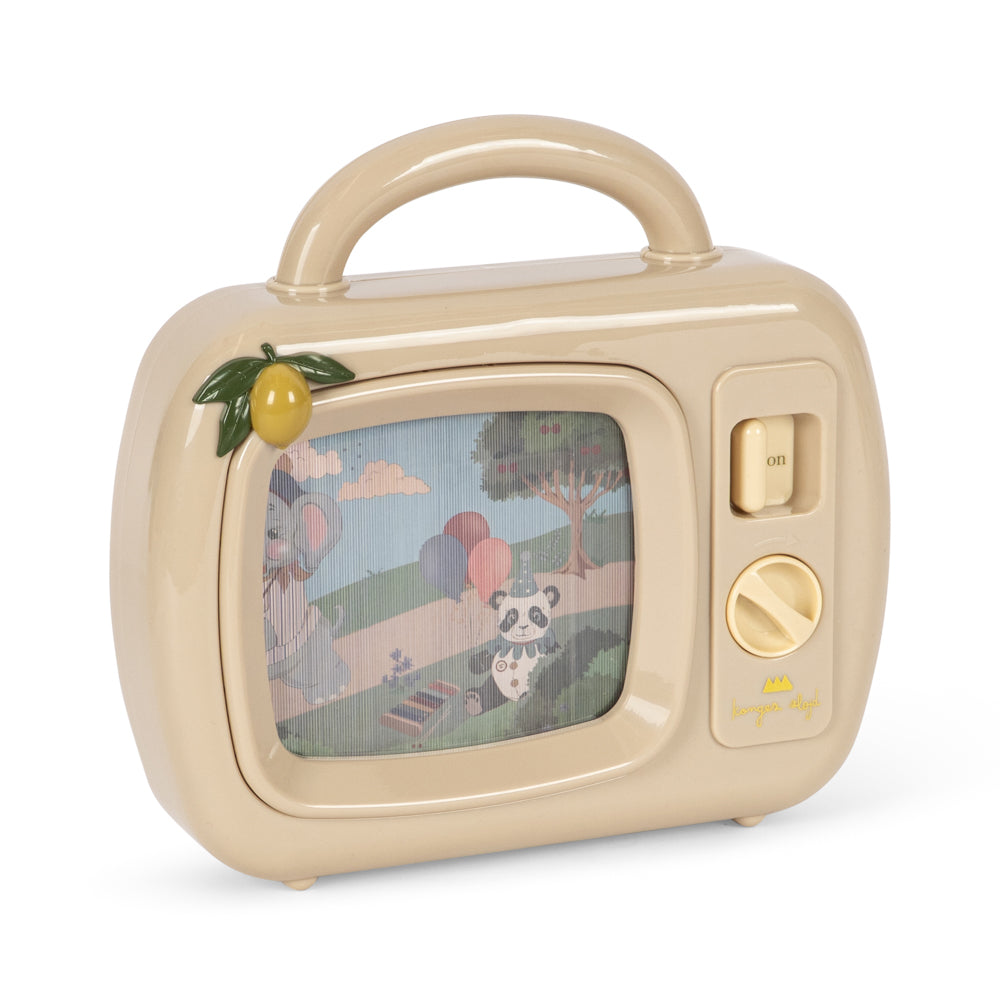 A retro-style beige toy television with a handle, featuring a colorful screen showing a panda and landscape, with a small yellow fruit decoration on the side, set against a plain white background.