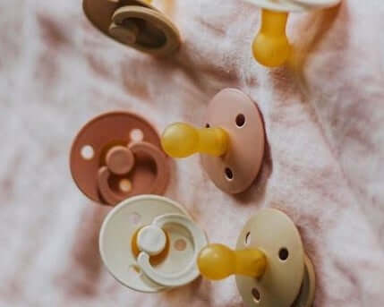 Bibs: Pacifier Nipple + Size Guide
