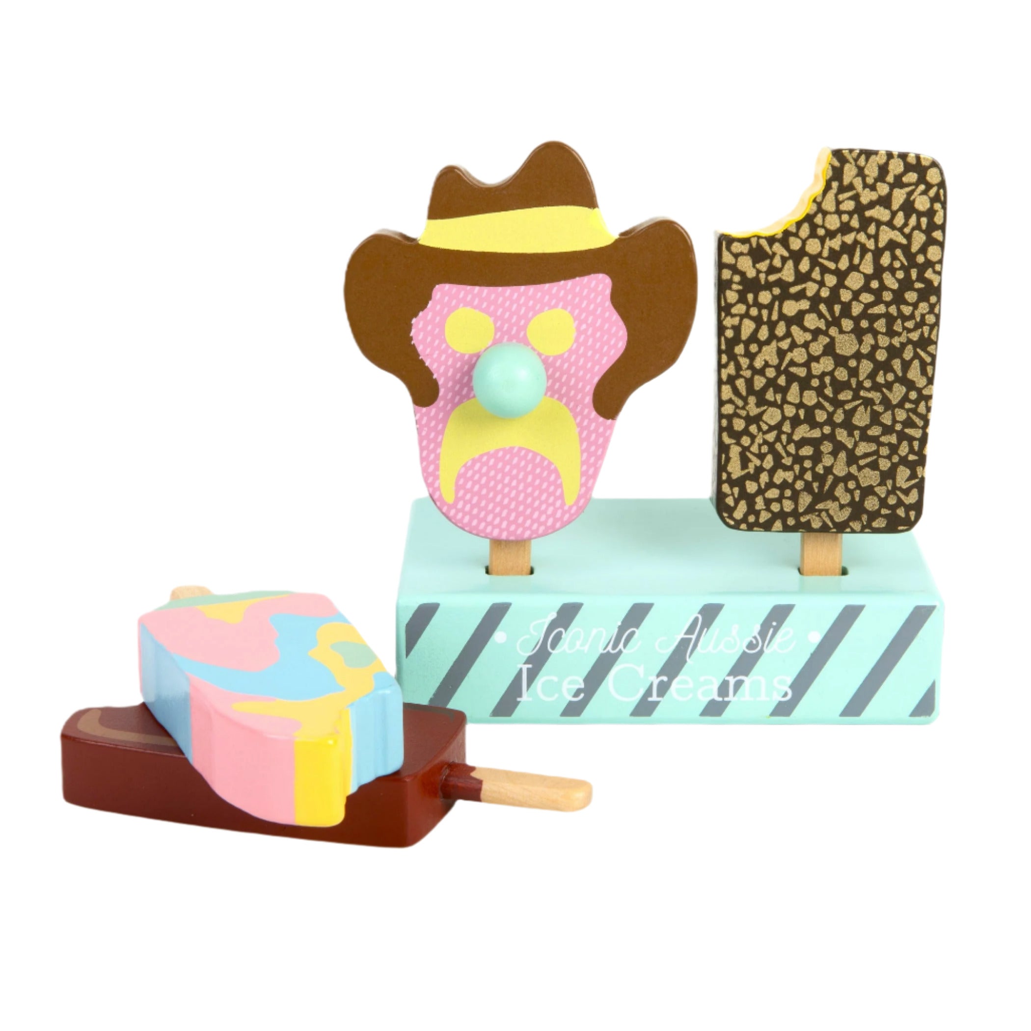 Wooden ice cream toys with a cowboy hat and leopard print cone on a white background