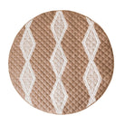 Round quilted placemat with geometric pattern on a white background