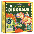 A boxed children's activity product titled "Roll for the Dinosaur" shown on a plain white background. The box features colorful dinosaur illustrations, a die, age rating "4+", and product text including "Glow in the Dark" and "Collect & Connect Fossils.