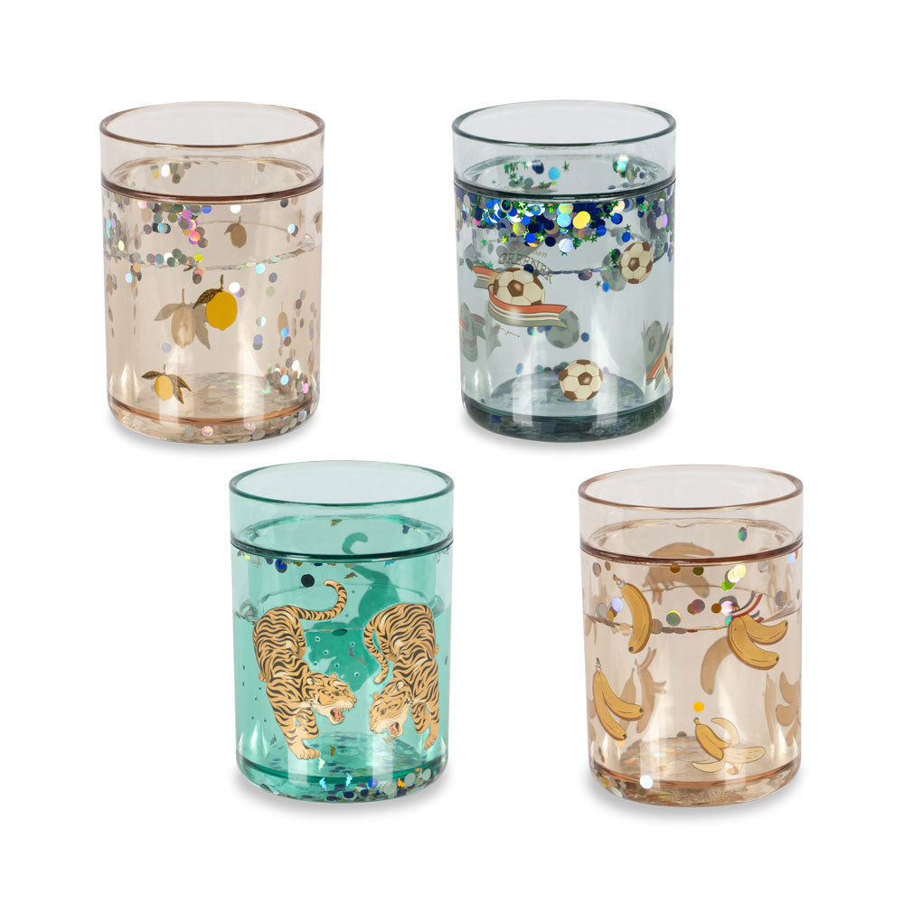 Four decorative tumblers with animal designs on a white background