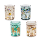 Four decorative tumblers with animal designs on a white background