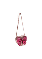 Heart-shaped bag with a pink bow on a white background
