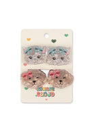 A pair of cat-shaped acrylic clips in a 2-pack, displayed on their original cream-colored backing card. The top pair is a gray cat with blue bows, and the bottom pair is a beige/tan cat with pink bows.