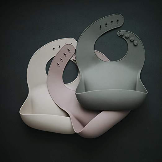 LOVE THIS! Mushie Silicone Baby Bib - Warm Taupe from Mushie - shop at littlewhimsy NZ
