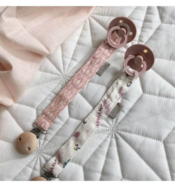 LOVE THIS! Cam Cam Pacifier Holder - GOTS - Pressed Leaves Rose from CamCam - shop at littlewhimsy NZ
