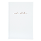 A white Pregnancy Journal with the title 'made with love' printed in gold lettering on the cover.
